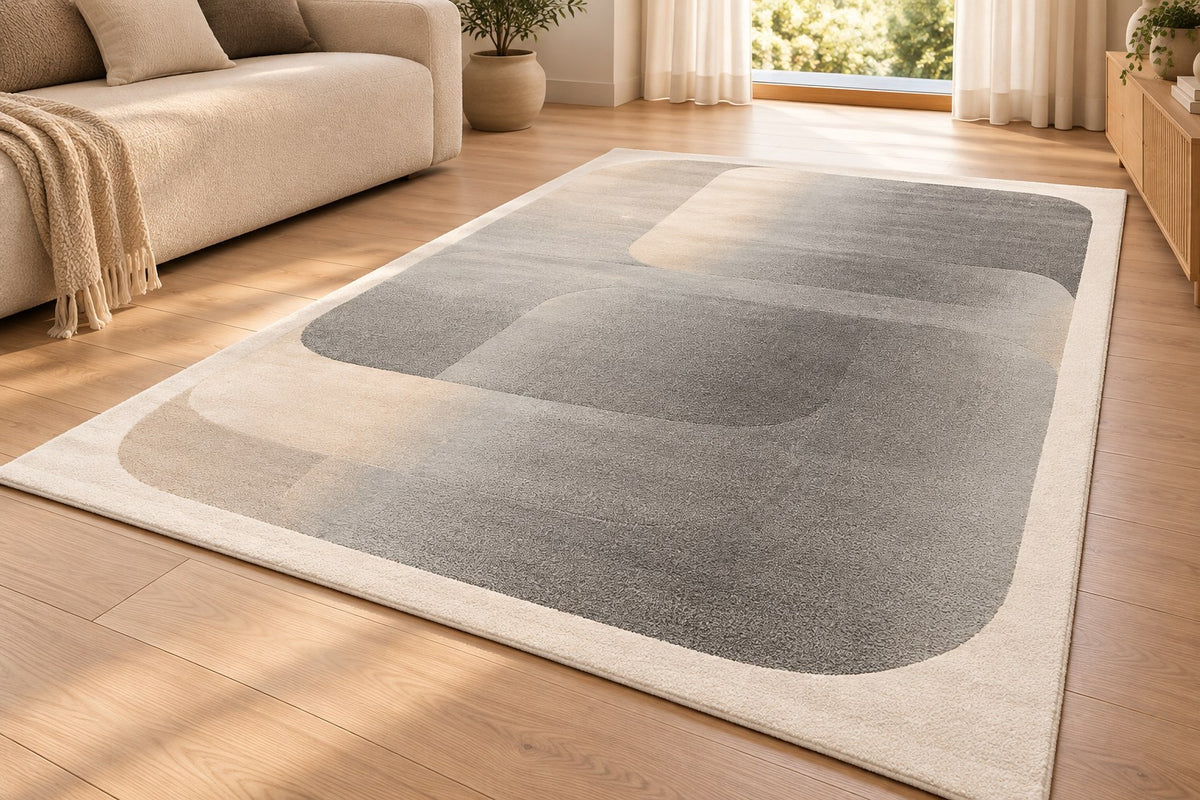 Tapis Solveig gris et sable à formes arrondies dans un salon